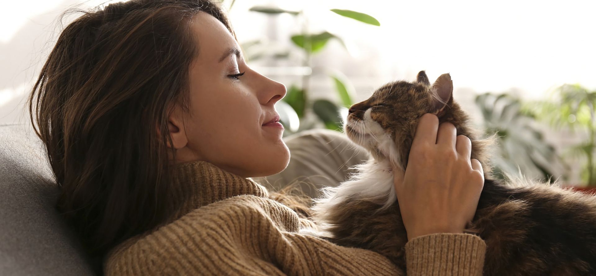 Cat laying on female chest.